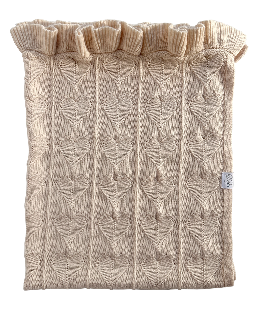 Organic cashmere merino luxury baby blanket. GOTS + OEKOTEX certified cozy blanket with heart and ruffle details.