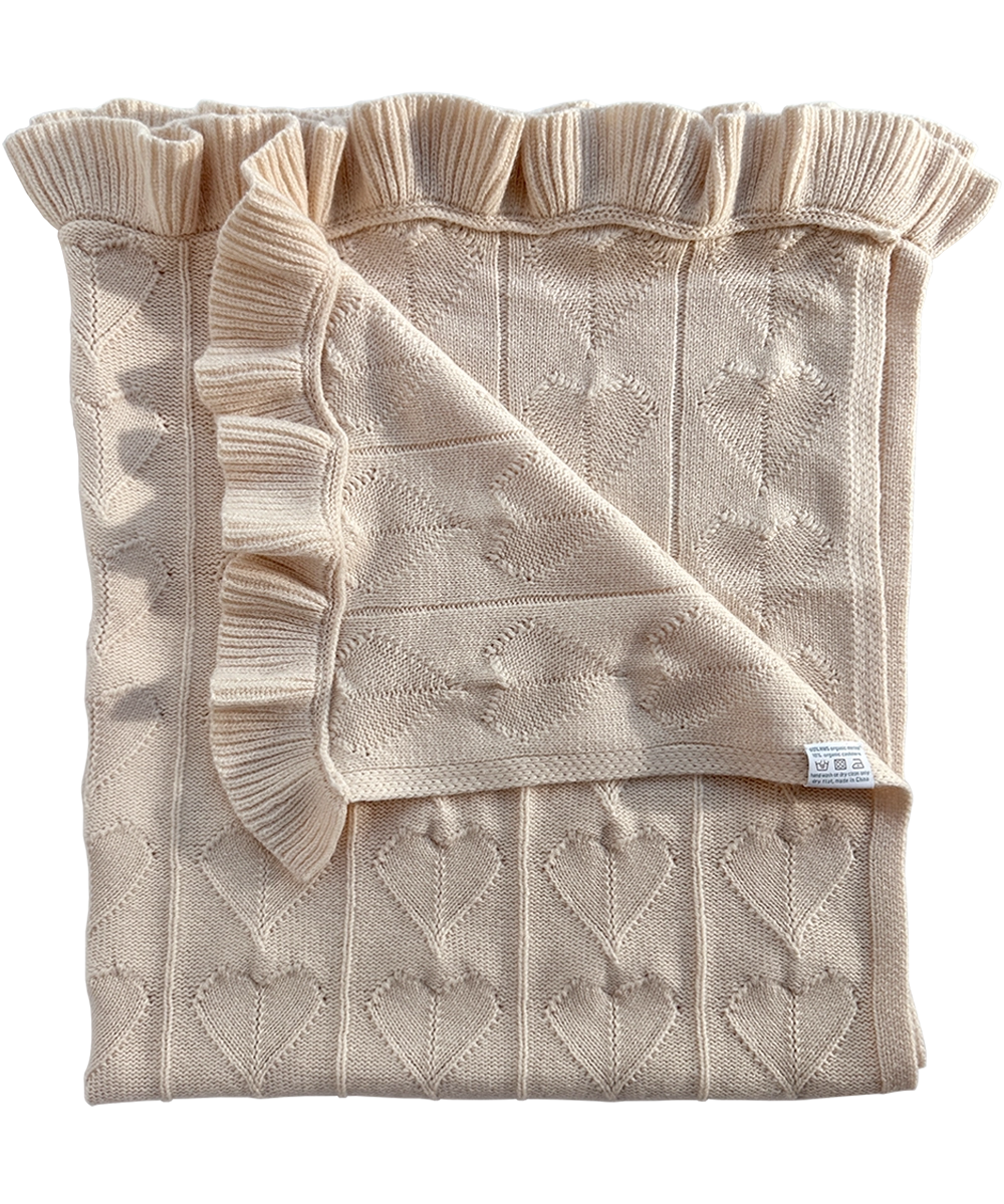 Organic cashmere merino luxury baby blanket. GOTS + OEKOTEX certified cozy blanket with heart and ruffle details.