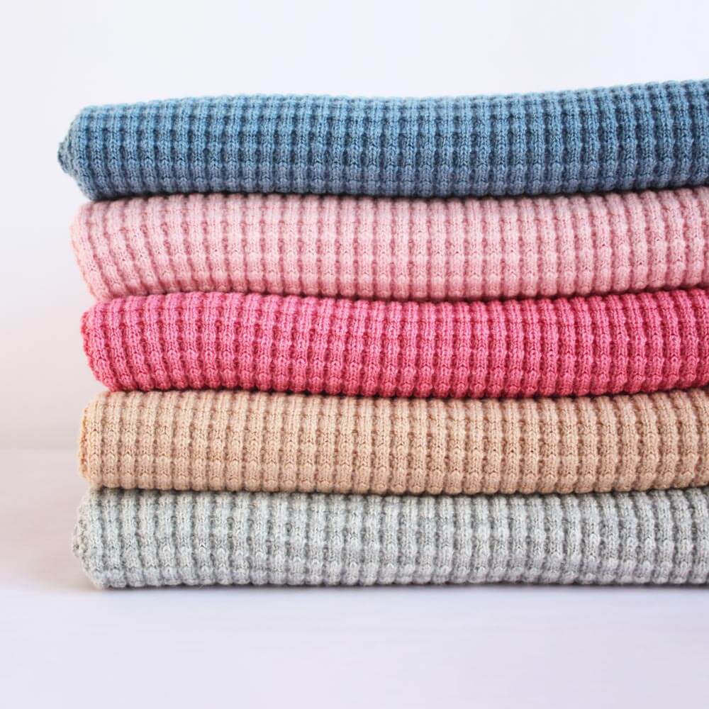 AU Baby non-toxic merino Popcorn blanket collection.